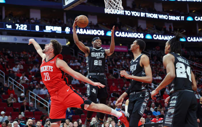 Dec 11, 2023; Houston, Texas, USA; San Antonio Spurs guard Malaki Branham (22) grabs a rebound during the first quarter against the Houston Rockets at Toyota Center.